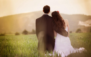 Bride groom sunset field mountains - a bride and groom free wallpaper