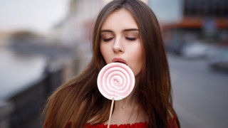 Woman longhair lollipop portrait blurry - her mouth free wallpaper