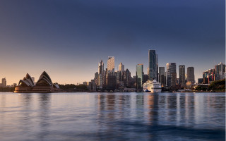 City skyline cruise ship waterfront - a large body of water in front free wallpaper