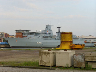 Large ship docked harbor concrete - a flemish baroque free wallpaper