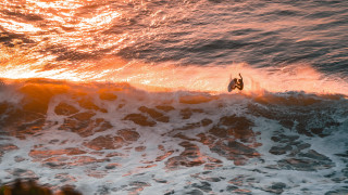 Surfing sunset ocean wave clouds - in the ocean free wallpaper