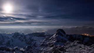 Mountain range full moon cityscape - a city below free wallpaper