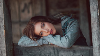 Woman leaning wooden ledge serious - eszter mattioni free wallpaper