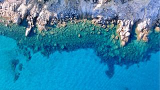 Rocky coastline aerial view boat - a rocky coastline free wallpaper