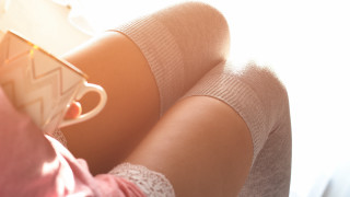 Woman sitting crossed lap book - a book in her hand free wallpaper