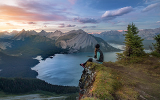Cliff lake mountains sunset man 2 - his lap free wallpaper for desktop