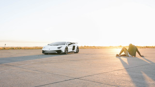 Man white car parking lot - the ground next free wallpaper for desktop