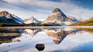 Mountain reflection lake rock trees - a rock in the foreground free wallpaper