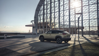 Car building sunshine futurism side - the side of it free wallpaper