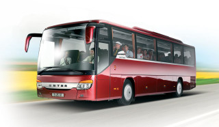 Red bus driving road people - side and a sky background free wallpaper for desktop