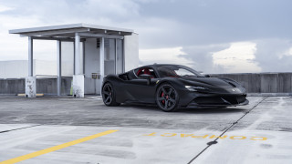Black sports car building parking - a yellow line free wallpaper