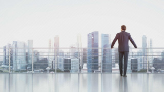 Man suit balcony city skyline - the glass free wallpaper