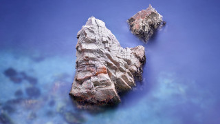 Rock formation water blue sky 2 - a rock formation free wallpaper for desktop