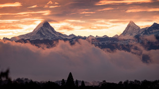 Mountain range clouds sunset cityscape 2 - free mountains wallpaper