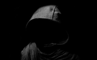 Hooded scarf person dark background - free dark wallpaper