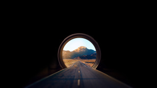 Night road mountains bridge sunset - round free wallpaper