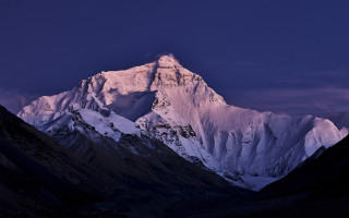Snow covered mountain dark sky - a dark sky in the background free wallpaper