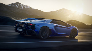 Blue sports car mountains sunset - cornelisz hendriksz vroom free wallpaper for desktop
