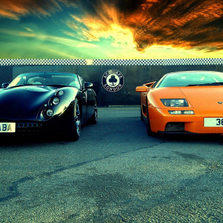Sports cars parking lot sunset - free cars wallpaper for tablet