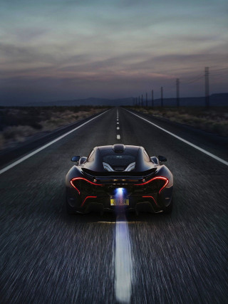 Black sports car night road 2 - the front of its free wallpaper