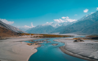 River valley mountains snow capped 3 - a valley free wallpaper