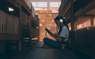 Girl sitting library headphones reading - music free wallpaper
