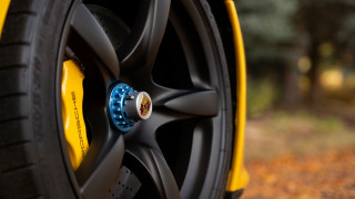 Yellow car tire blue spokes - a yellow car free wallpaper