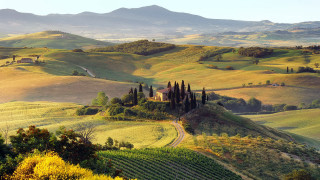 Scenic farm road mountains sunset - correggio free wallpaper