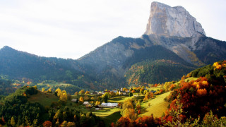 Mountain village autumn leaves fire - a scenic view of a mountain free wallpaper
