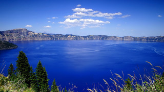 Lake mountains trees sky bird - a large body of water free wallpaper