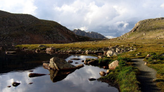 Small stream lush green valley - a lush green valley free wallpaper