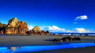 Beach rocks water blue sky 7 - rock and water free wallpaper