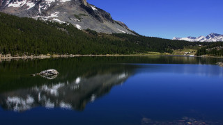 Mountain lake trees rock mountain - a mountain lake free wallpaper