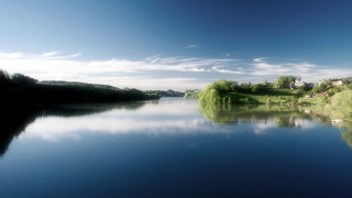 Lake boat trees sky clouds - a sky free wallpaper for desktop