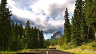 Mountain road trees clouds nature - carl hoppe free wallpaper