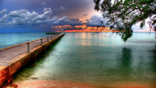 Long pier ocean cloudy sky - a long pier free wallpaper