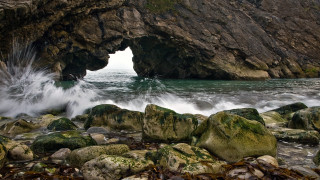 Cave entrance waves rocks outcropping - adobe lightroom free wallpaper