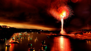 Fireworks water boats clouds dusk - a firework free wallpaper