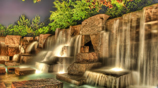 Waterfall rocks bench tree architecture - a bench in the middle of it free wallpaper