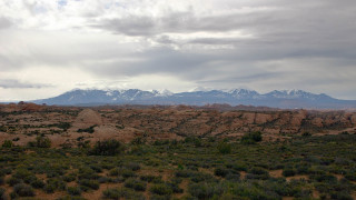 Mountain range snow capped forefront - plein air free wallpaper