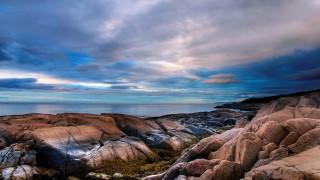 Rocky beach water cloudy sky 3 - a few cloud above free wallpaper
