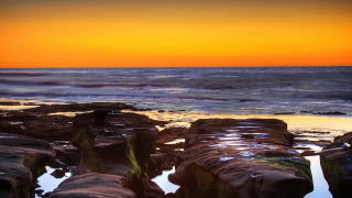 Sunset ocean rocks water beach - rock and water free wallpaper