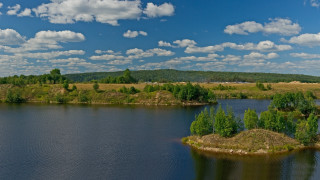 Lake trees hill clouds islands - tree and a hill in the background free wallpaper