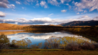 Lake mountains cloudy sky trees 6 - mountain under a cloudy sky free wallpaper