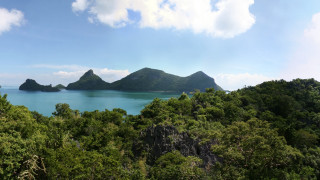 Tropical island lagoon mountains panorama - a tropical island free wallpaper