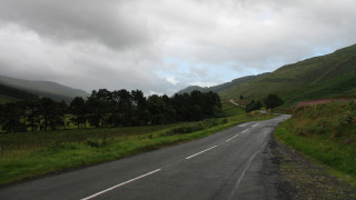 Road curved hill trees lake - both side free wallpaper for desktop