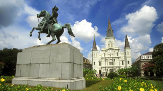 Statue horse building spire clock - a horse in front free wallpaper