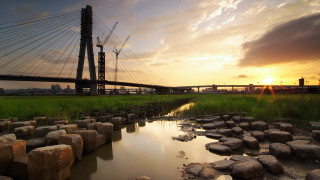 Bridge river sunset rocks cityscape 2 - wide angle len free wallpaper for desktop