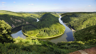Lush river valley mountains forest - adriaen isenbrant free wallpaper