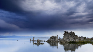 Lake rocks mountains sky cityscape - a bunch of rocks free wallpaper